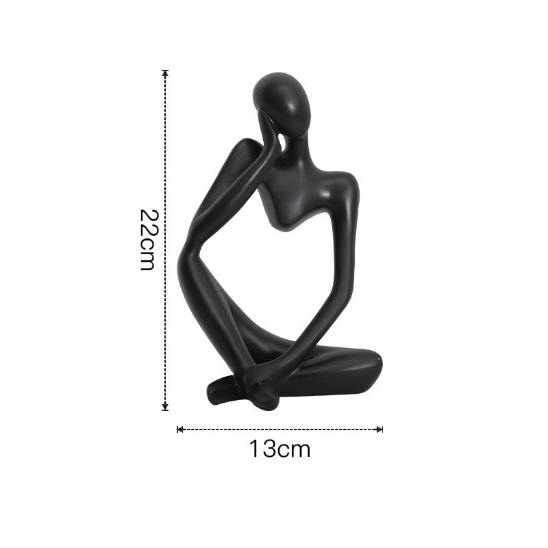 Minimalistic & Affordable Interior Design For a Feel-Good Atmosphere Abstract Thinker Statues - hbound-design