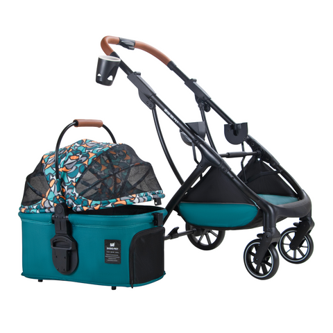 green pawbella pet stroller with basket disconnected on white background