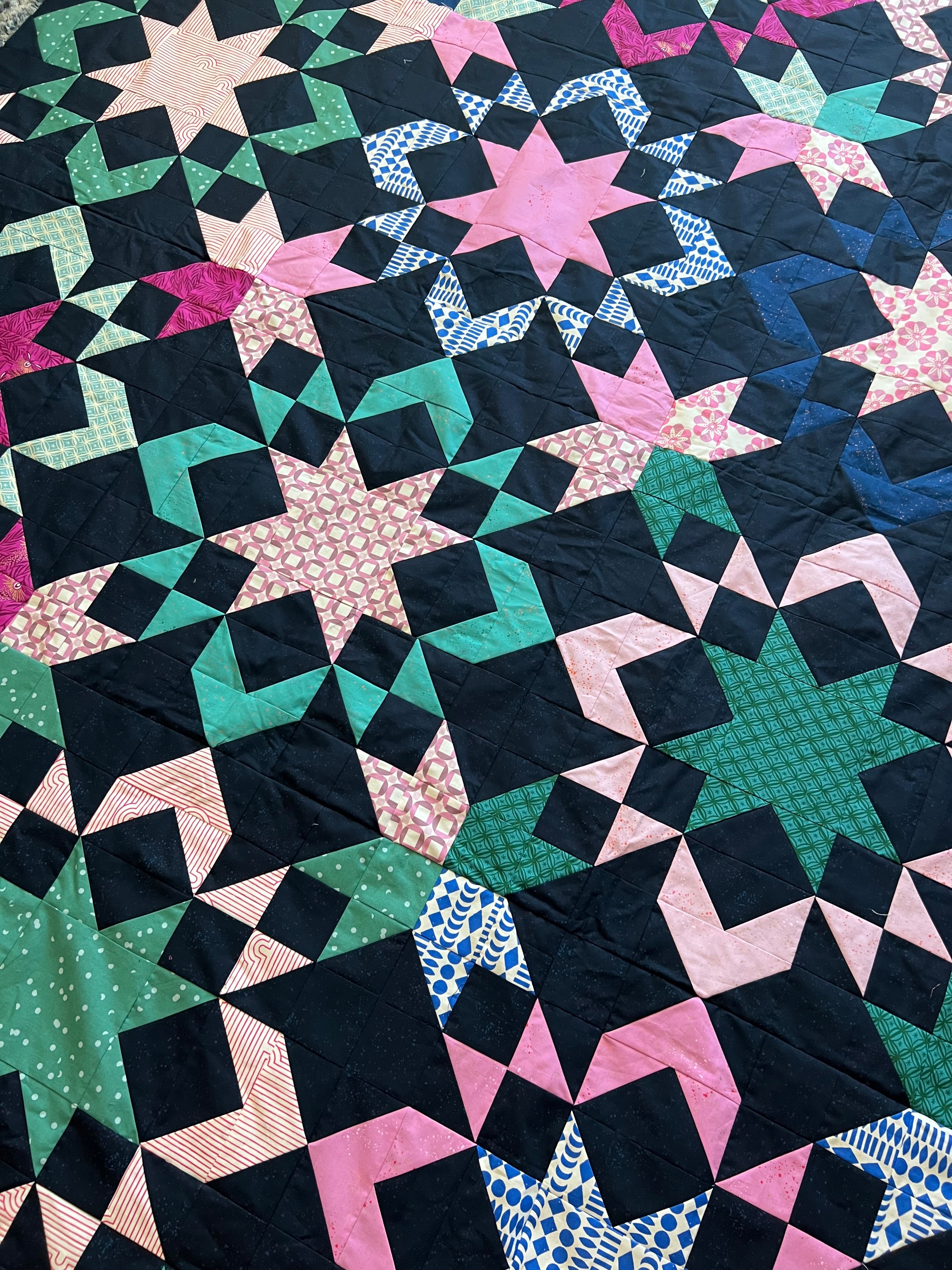 Starly Quilt made by Sarah. A modern but classic sawtooth star block quilt pattern by Cotton and Joy.