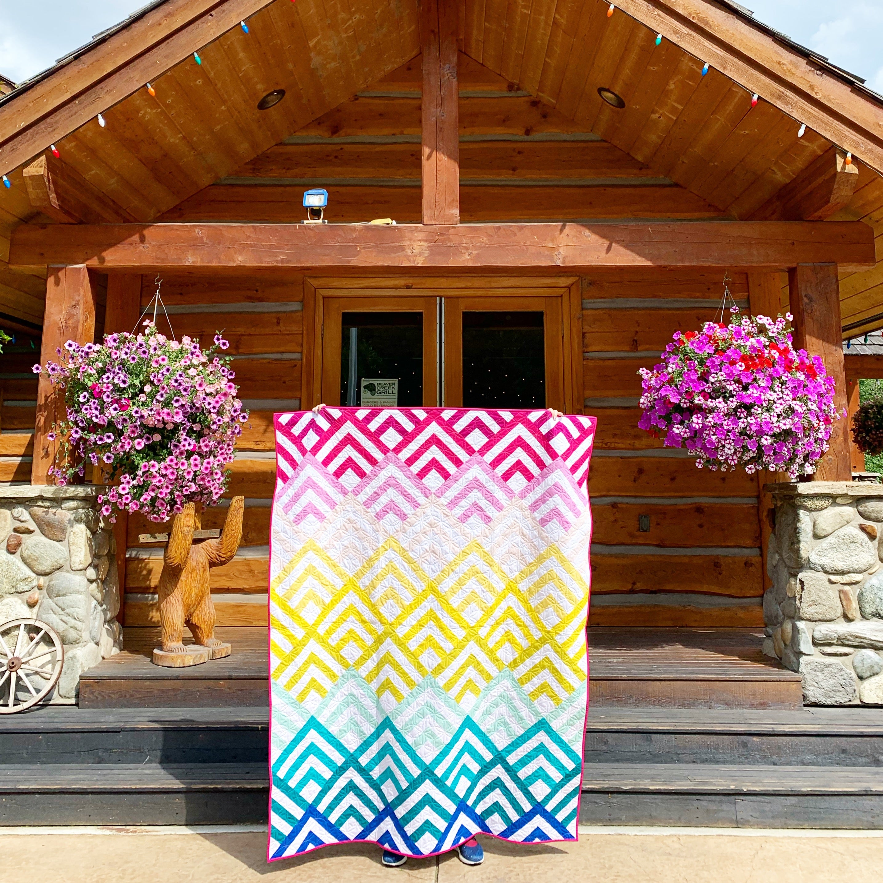 Cabin Peaks quilt patten - a modern quilt pattern that takes on the classic log cabin quilt block.