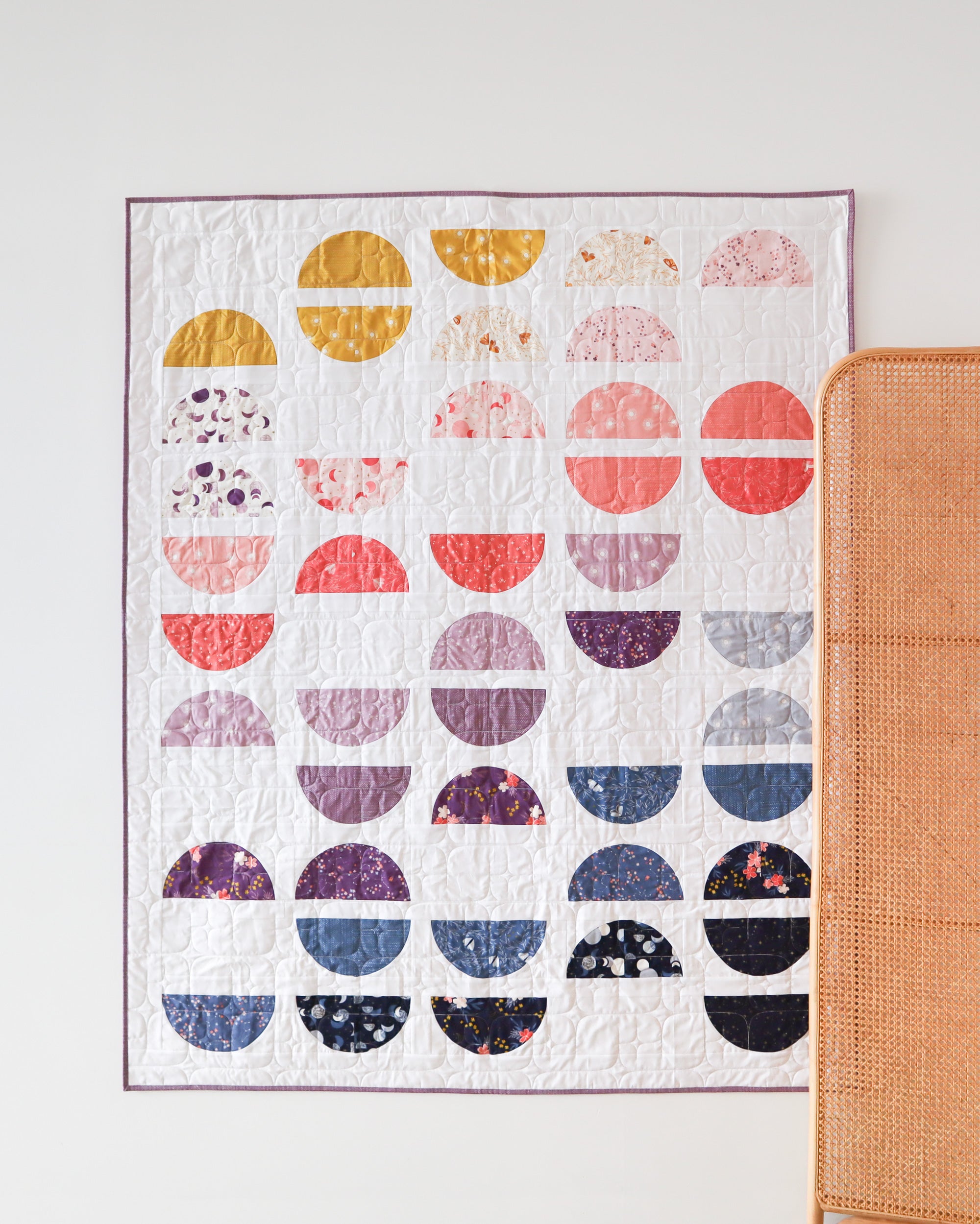 Crescent II Quilt Pattern by Cotton and Joy. A modern quilt pattern, layer cake friendly and perfect for highlighting your favoriie prints