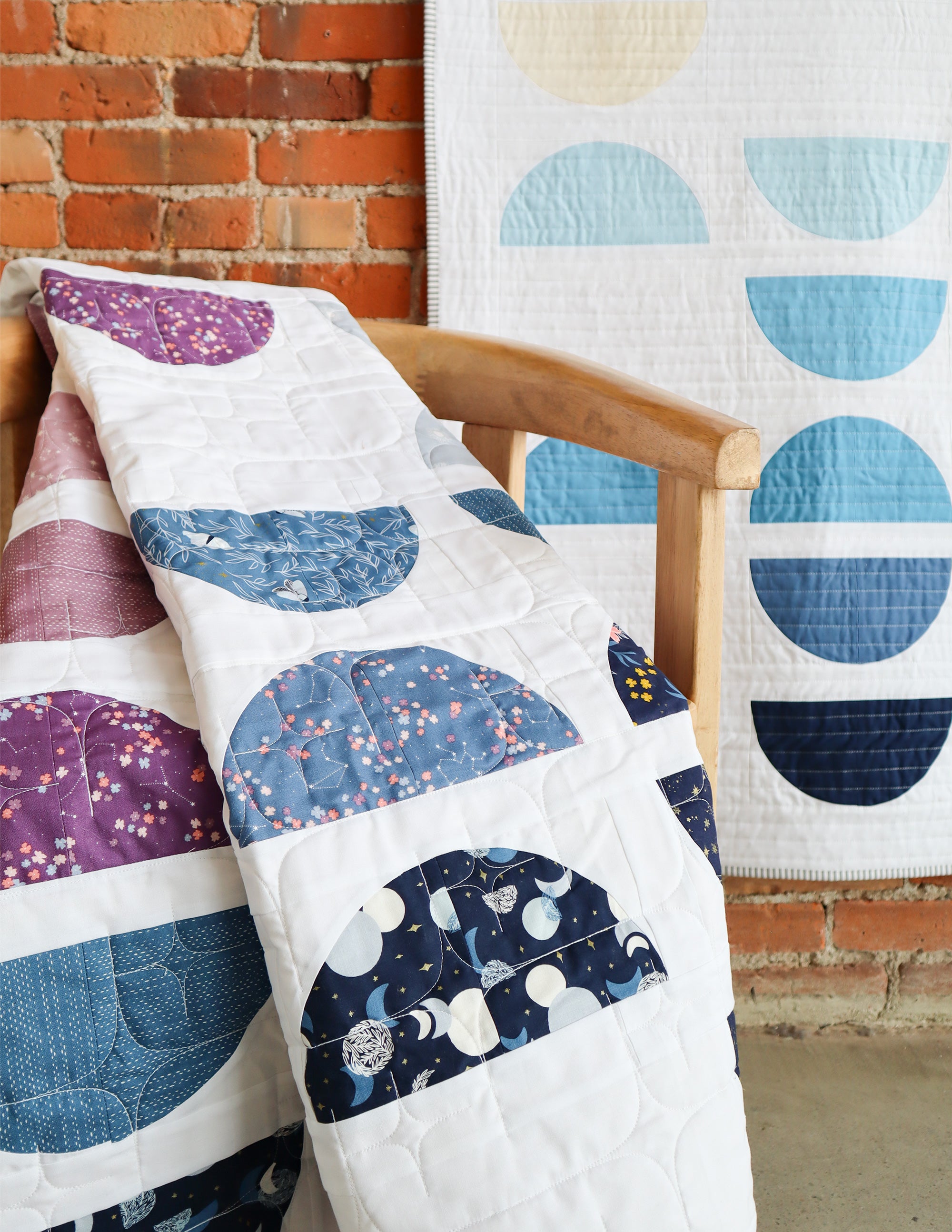 Crescent II Quilt Pattern by Cotton and Joy. A modern quilt pattern, layer cake friendly and perfect for highlighting your favoriie prints