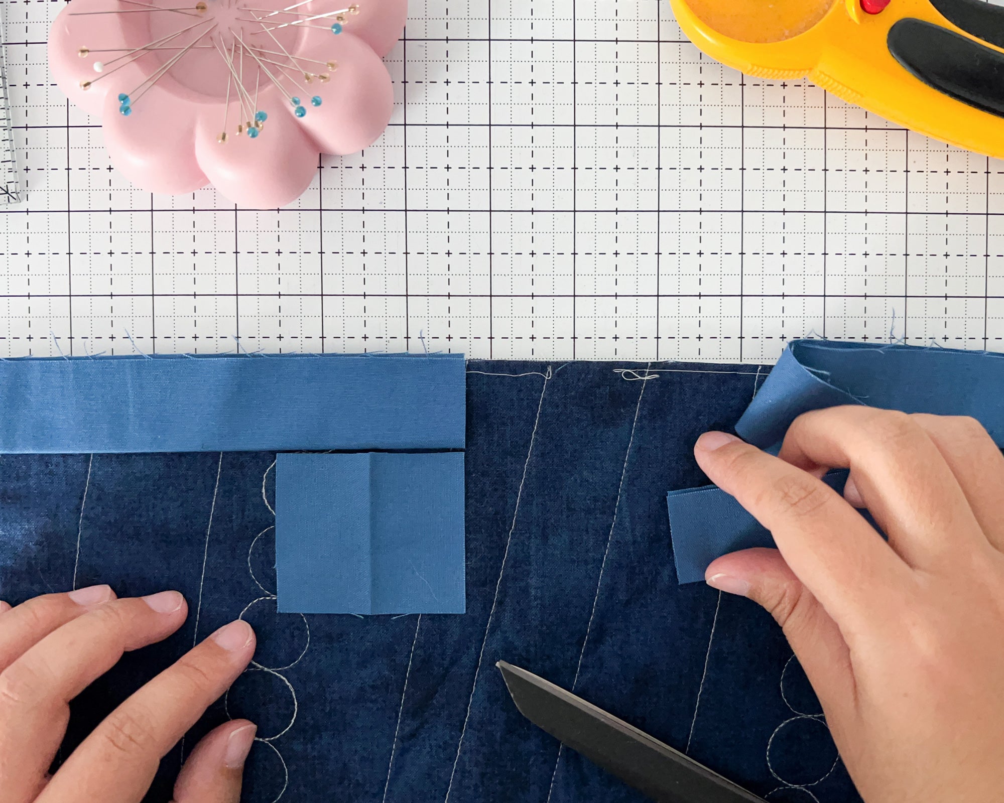 Learn how to sew your binding onto your quilt with this beginner-friendly binding tutorial from Cotton and Joy.