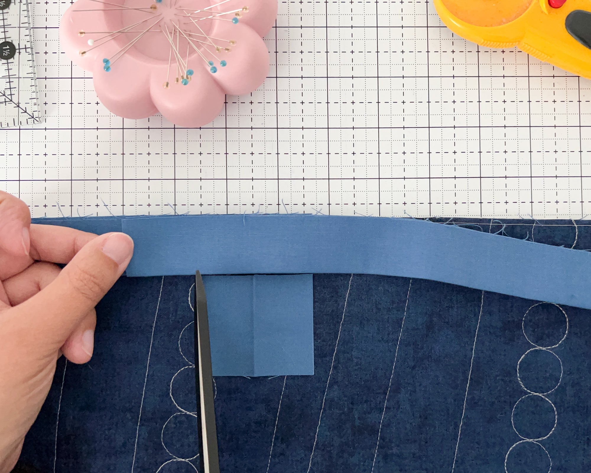 Learn how to sew your binding onto your quilt with this beginner-friendly binding tutorial from Cotton and Joy.