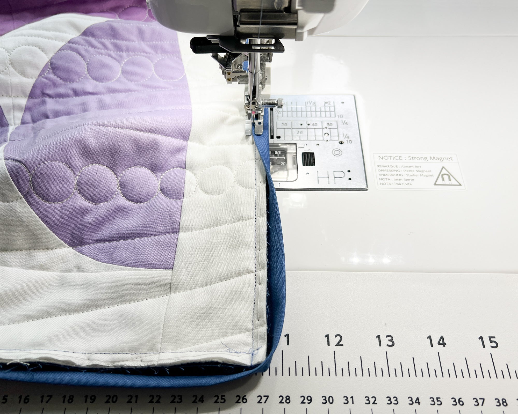 learn how to machine bind your quilt using your home sewing machine for beginners