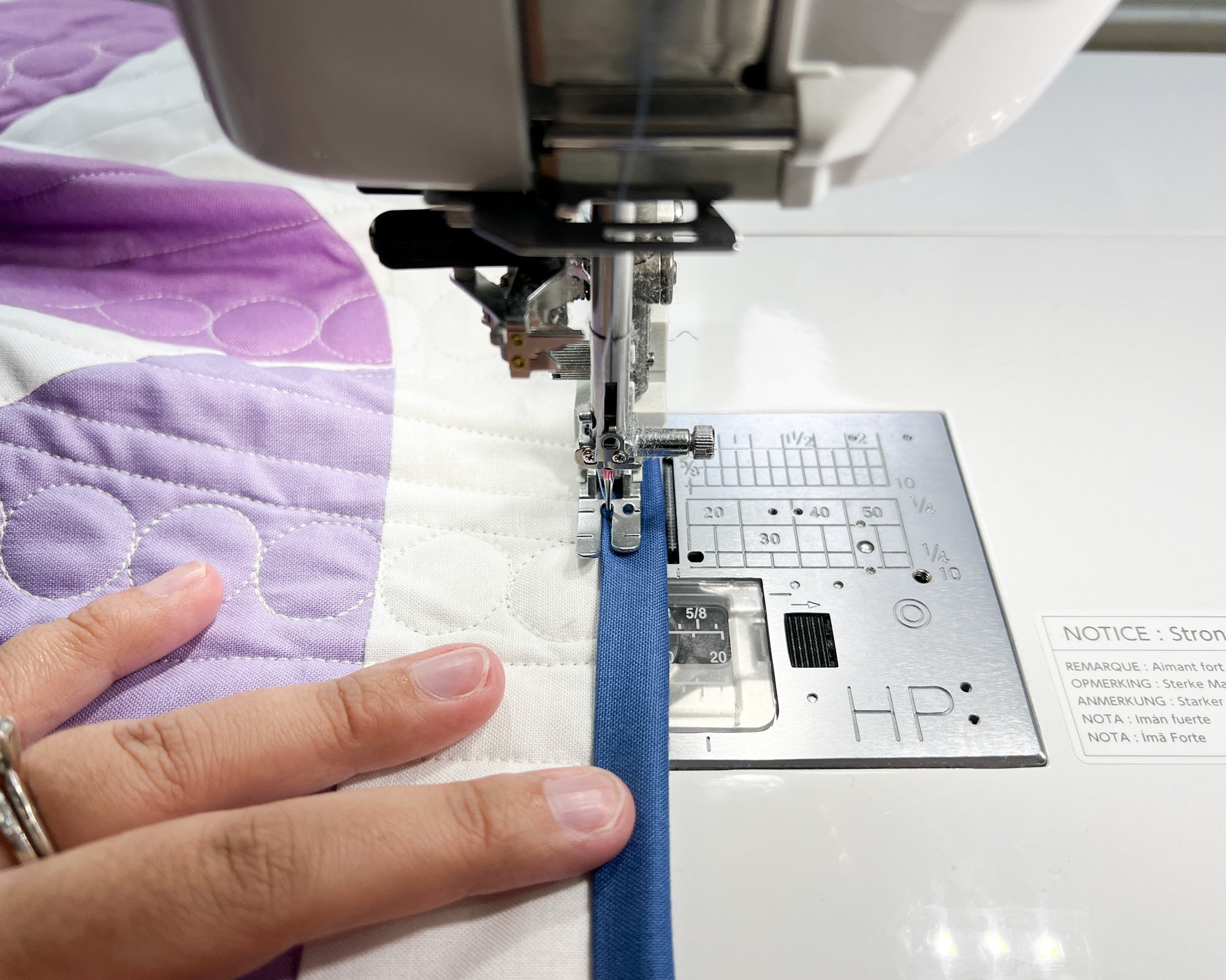 learn how to machine bind your quilt using your home sewing machine for beginners