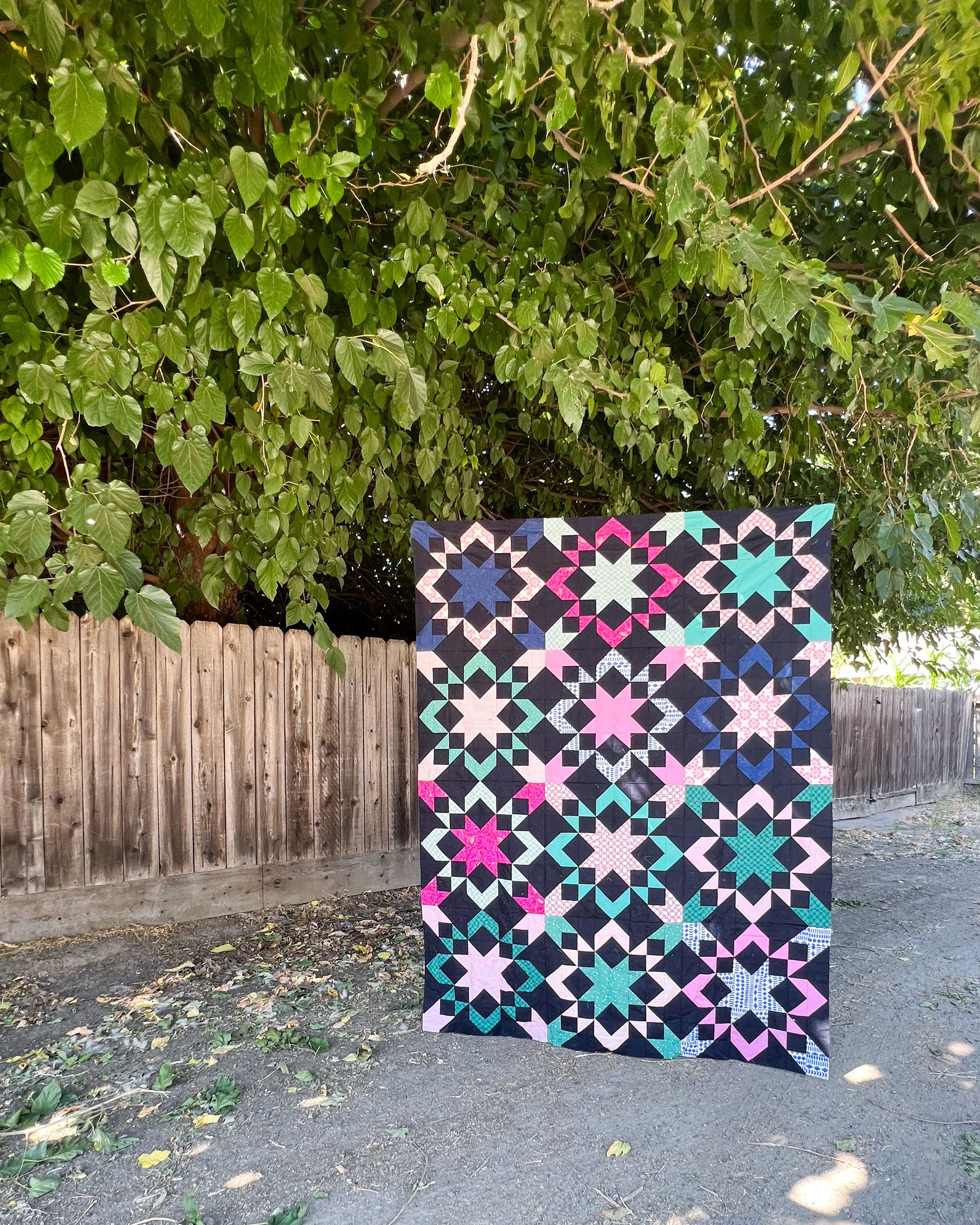 Starly Quilt made by Sarah. A modern but classic sawtooth star block quilt pattern by Cotton and Joy.