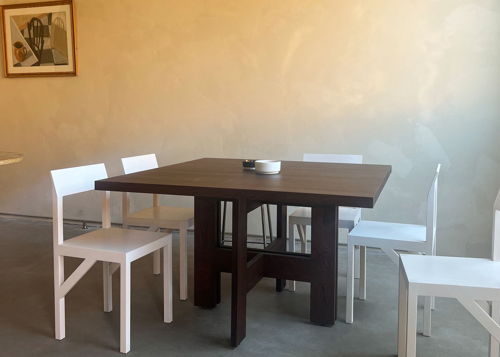 A minimalist modern table and chairs as seen in Copenhagen, Denmark