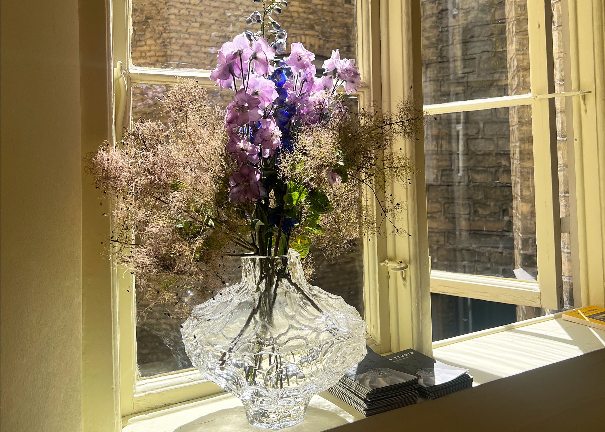 A vase by Rebecca Hein Hein Studio sitting in the window of 3daysofdesign at a building in Copenhagen, Denmark