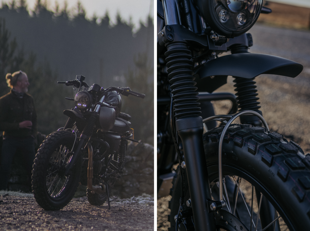 Rider resting on a natural rock wall after a long ride. The Mushman in foreground of these crisp winter morning shots. The details of the rock catcher and knobbly tires are the main focus.