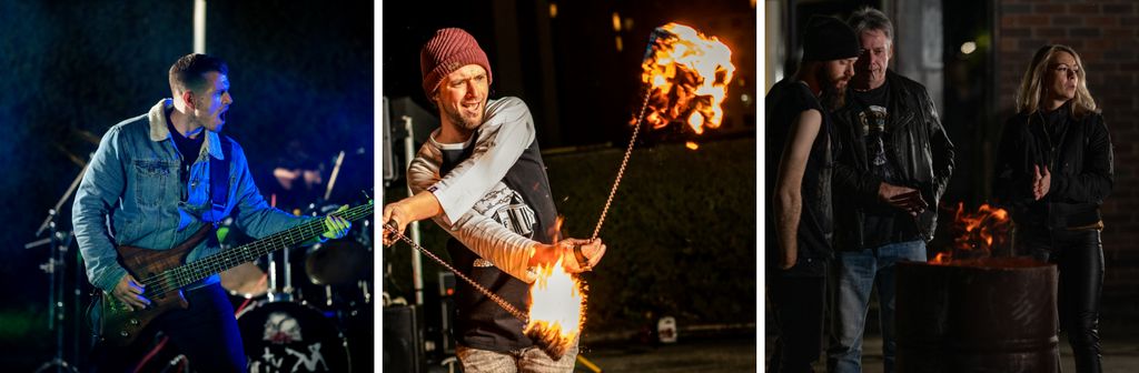 A guitar player, a fire dancer and a crowd gathered around a fire at a Motorcycle Store Opening Event