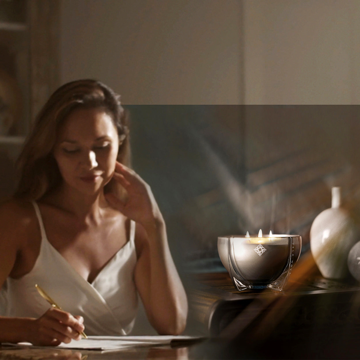 Ink flows as she writes—Reawakening’s chypre blend of apricot, camellia, and cashmere lingers, a quiet ritual of renewal