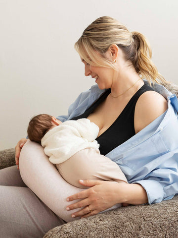 woman breastfeeding with bbhugme nursing pillow