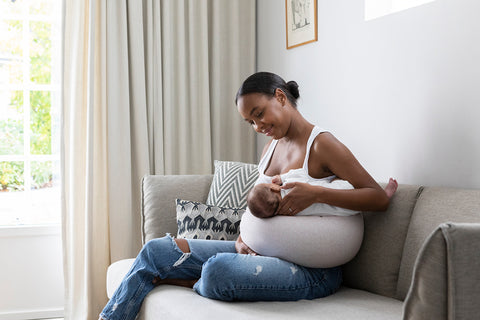 woman nursing her baby