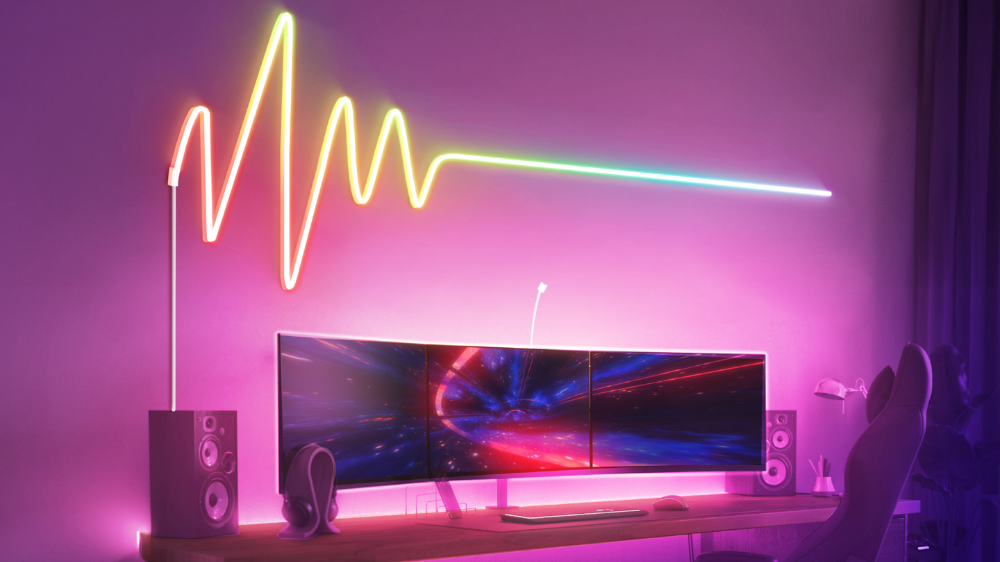 Game room with neon flex on wall.