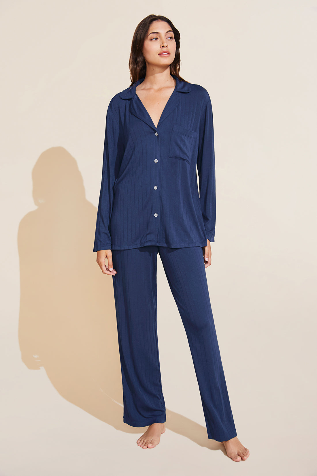 Model wears Gisele TENCEL™ Modal Rib Long PJ Set in navy.