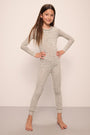 Model wears Kids Printed TENCEL™ Modal Unisex Long PJ Set in ella spark/moss.