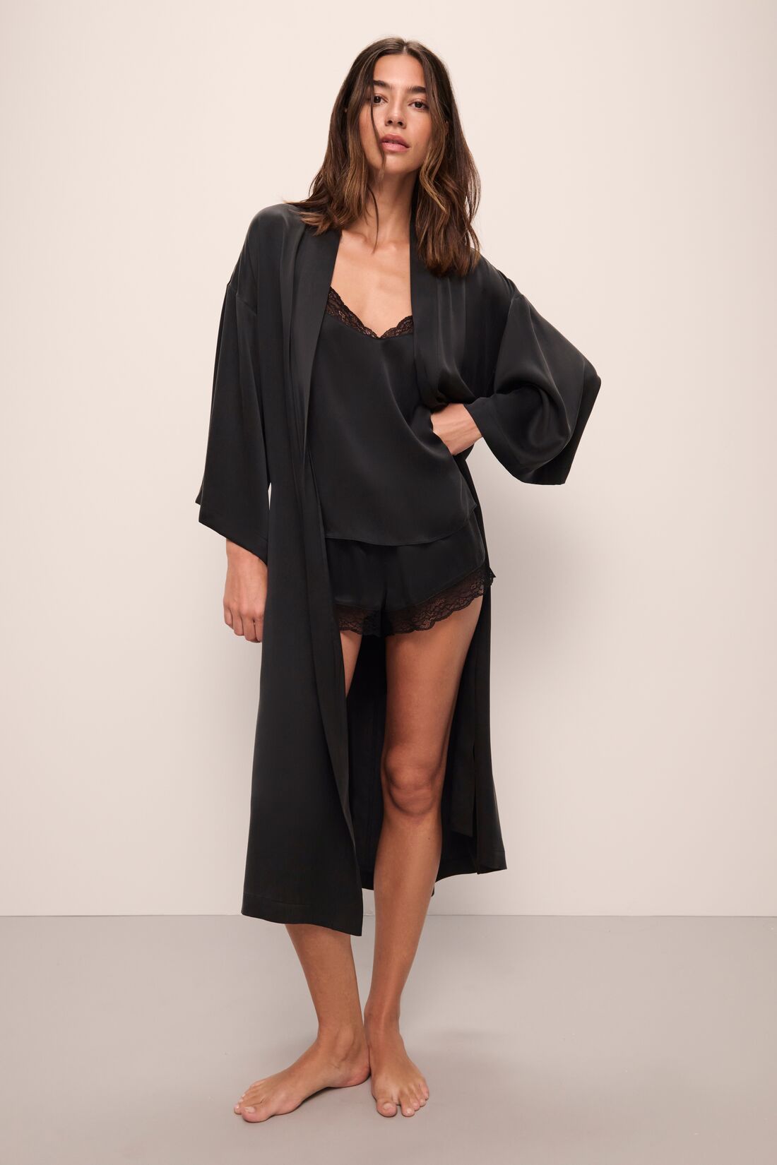 Model wears Inez Washable Silk Robe in Black.