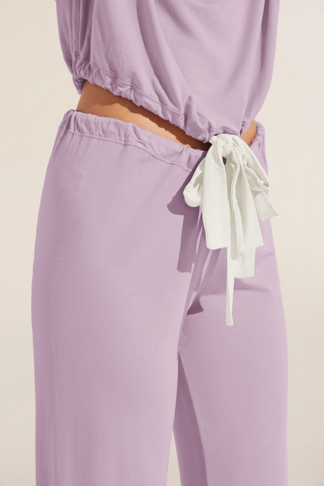 Model wears Gisele TENCEL™ Modal Slouchy PJ Set in lavender/ivory.