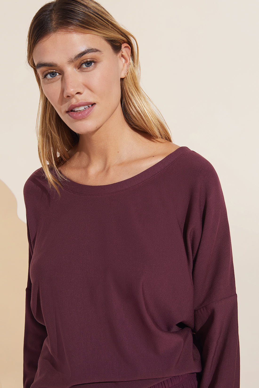 Model wears Softest Sweats Plush TENCEL™ Top in mulberry.