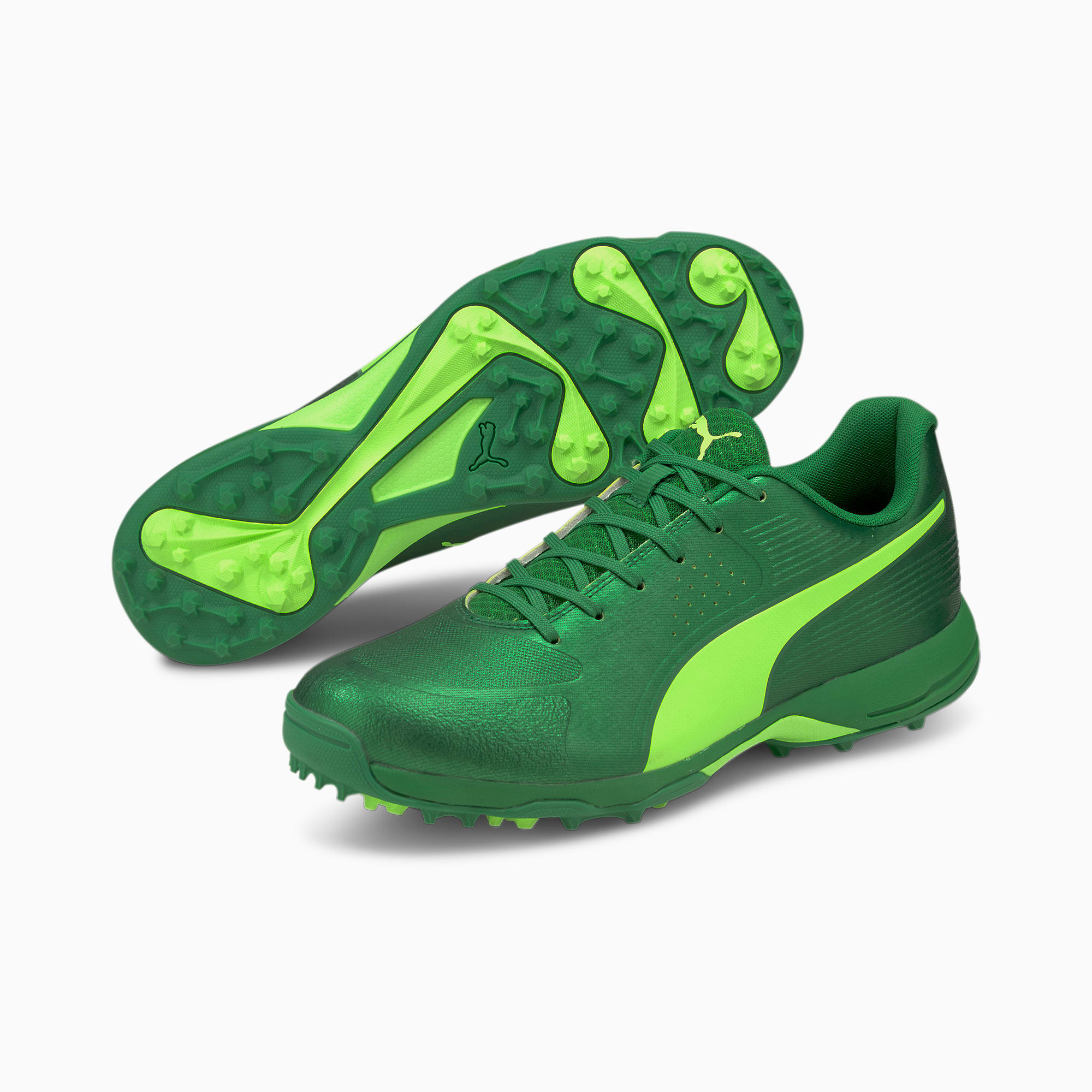 Puma pink fluorescent hot sale green cricket shoes