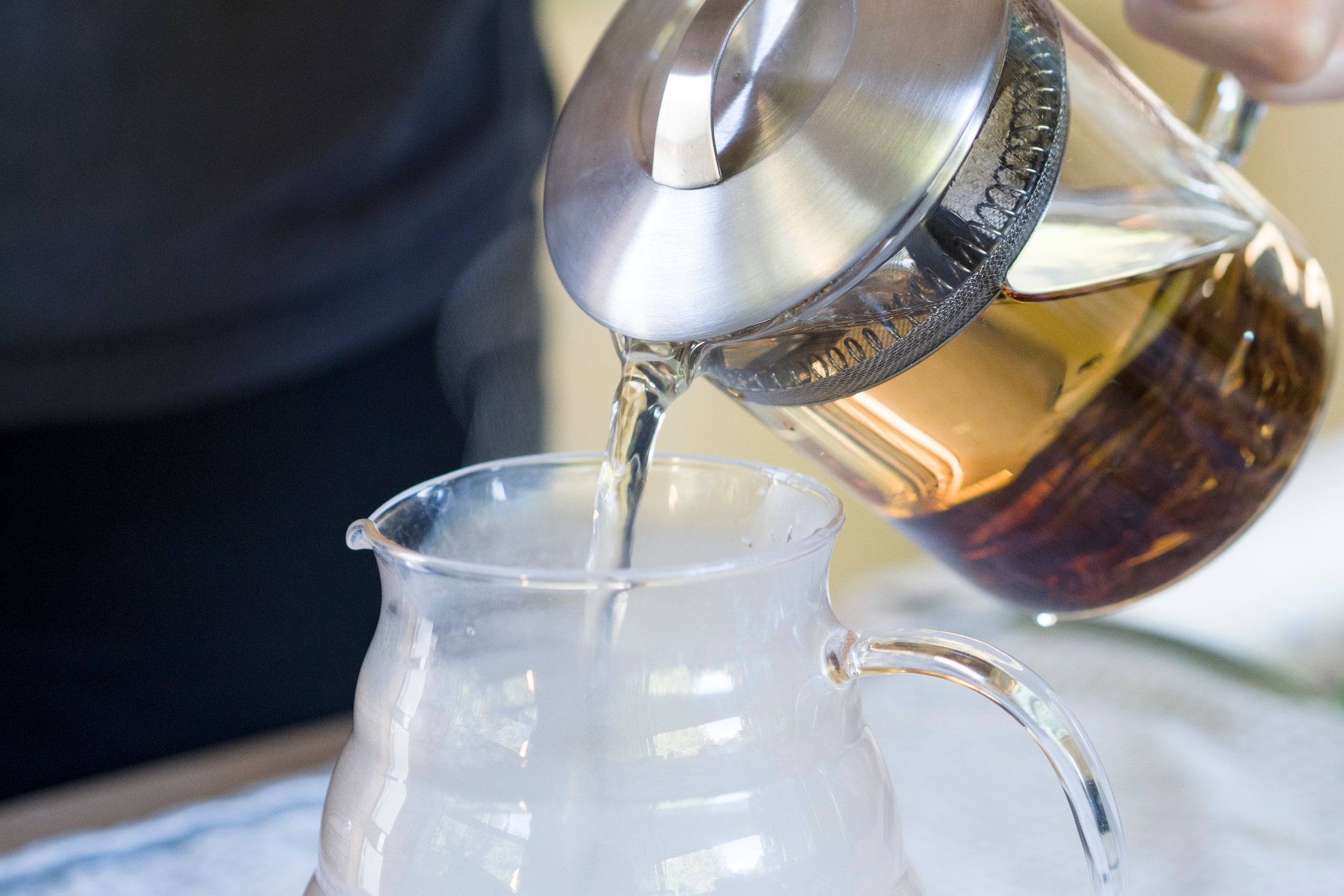 Brewed tea being poured.