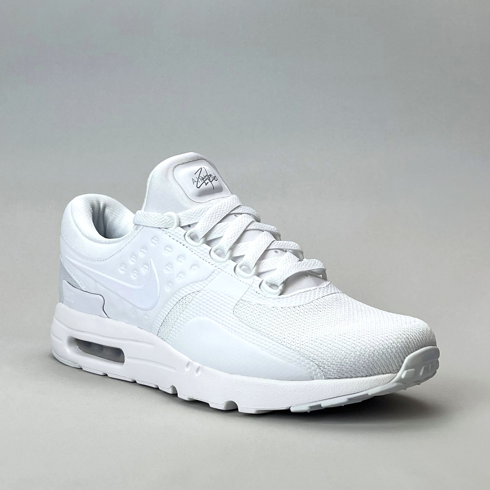 nike air max zero essential triple white