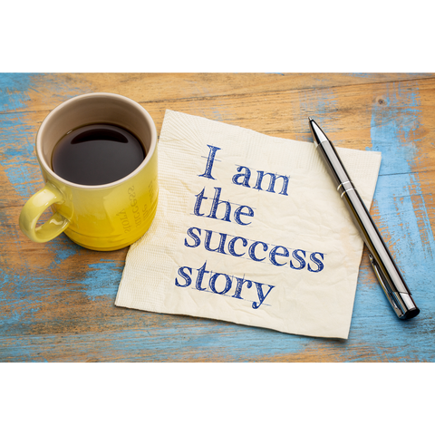 coffee mug with a sign written: I am the success story