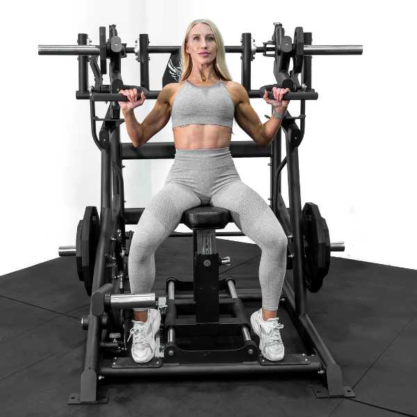 Female User of Bolt Fitness Armada Plate Loaded Shoulder Press