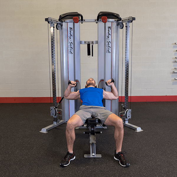 The Basics of Functional trainer machines with man bench pressing