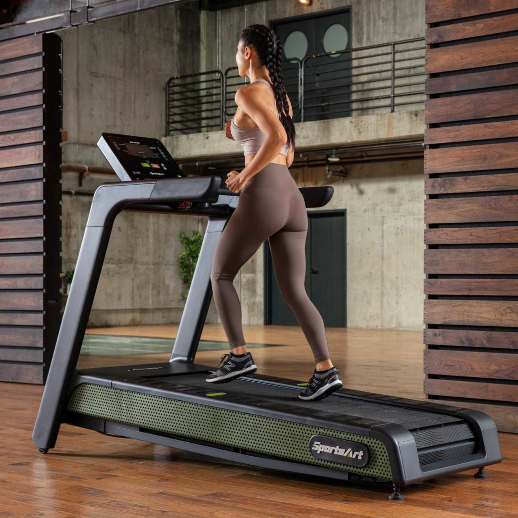 SportsArt G660 Treadmill Female Runner