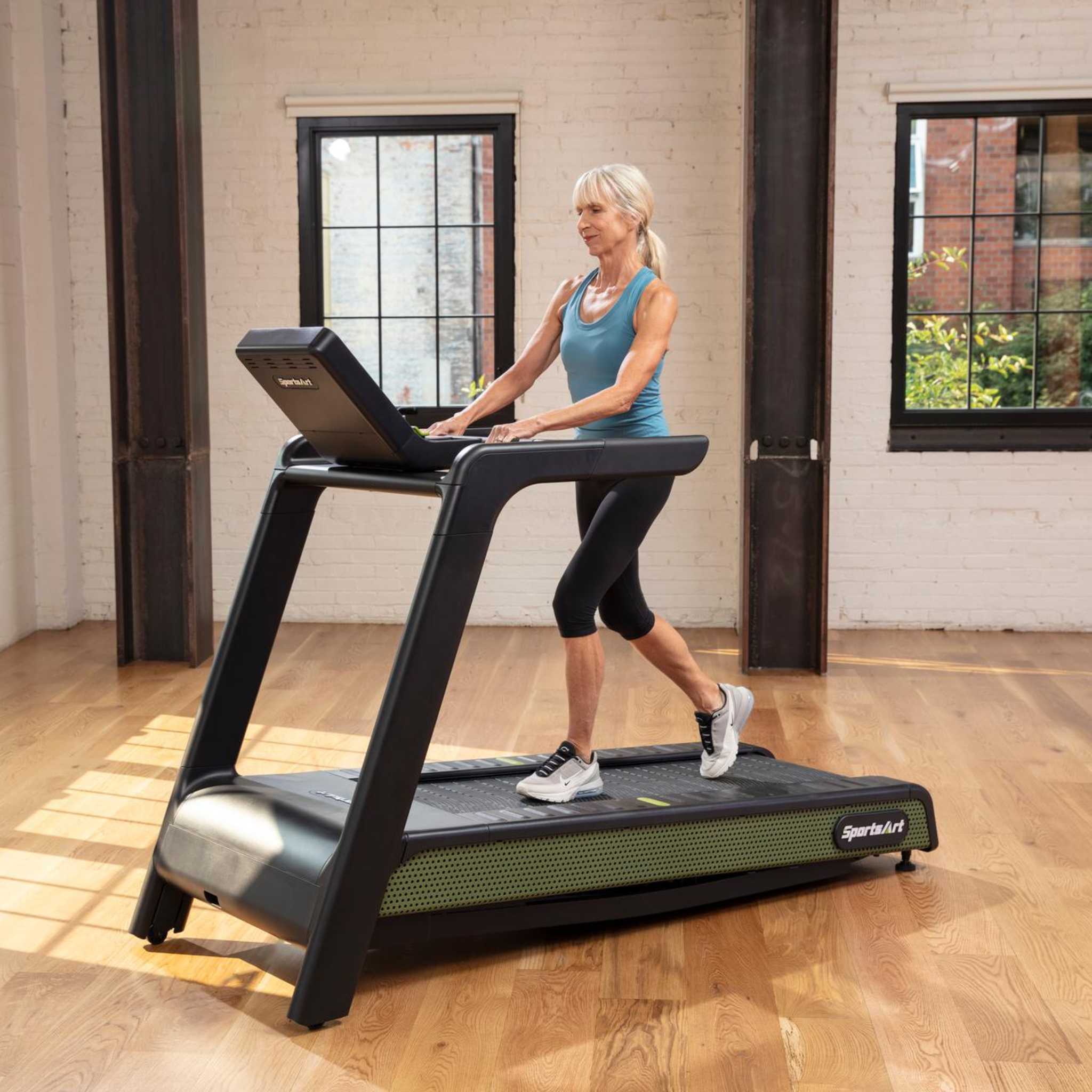 SportsArt G660 Treadmill Female Exercise