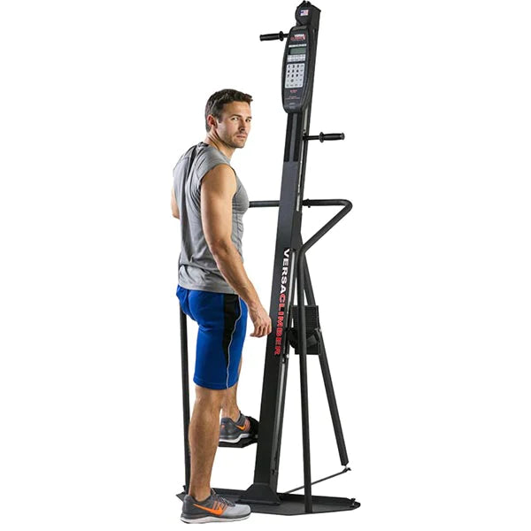 VersaClimber Machine with Male looking back at us