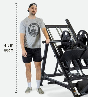 Bells of steel leg press machine suitable for all sized users tall or short with tall man standing next to it