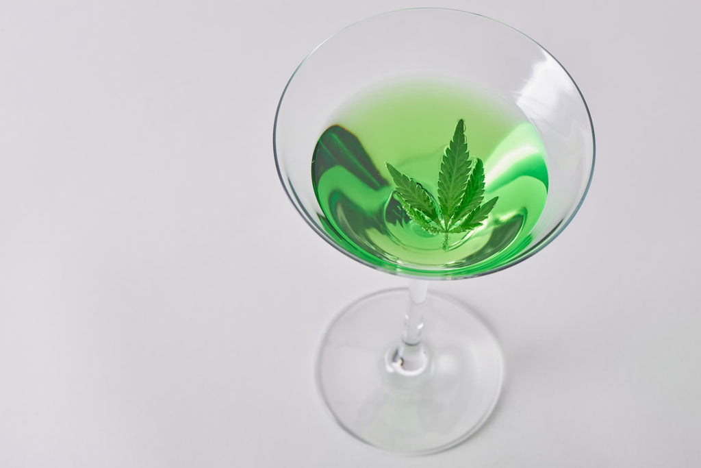 CBD drink with cannabis leaf