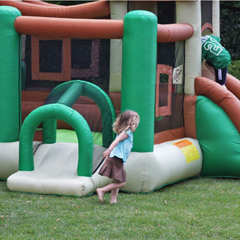 kid-running-around-to-slide-again-on-kid-wise-clubhouse-climber-bounce-house