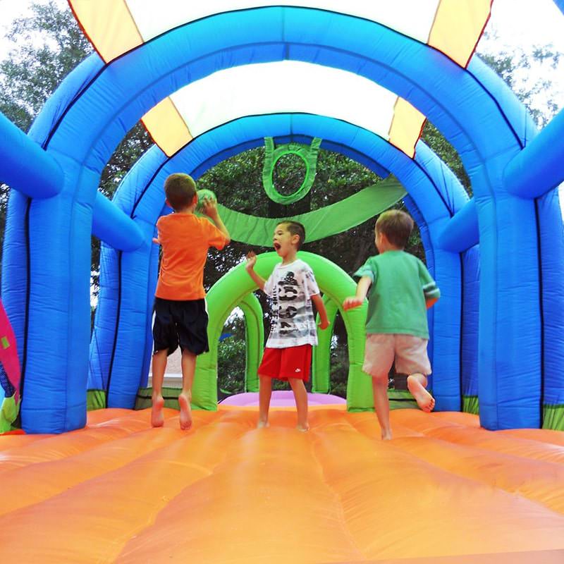 kid-wise-arc-arena-ii-sport-bounce-house-3-kids-playing-and-shooting-the-ball