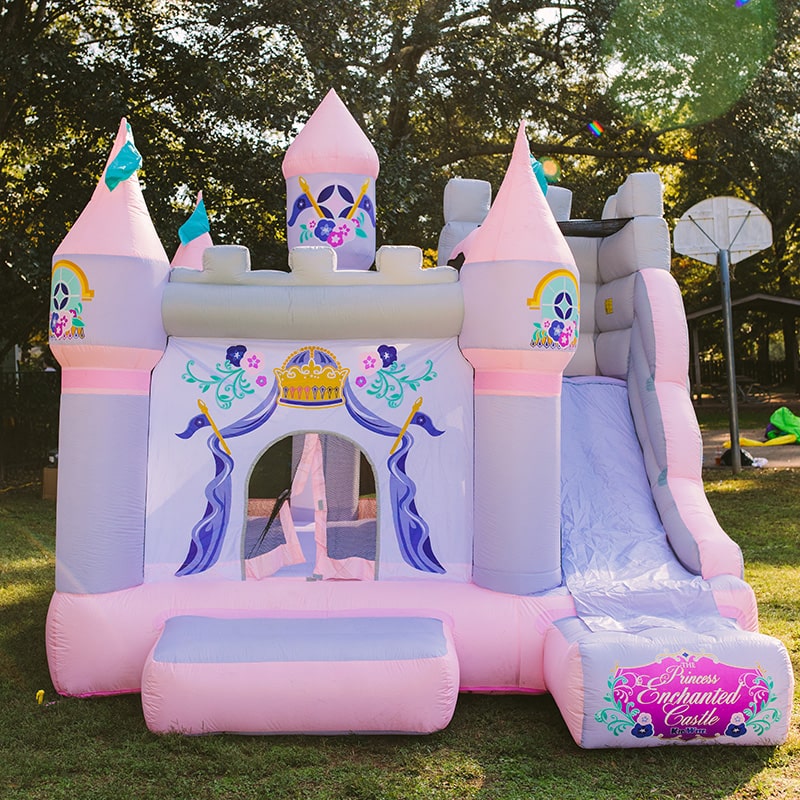 kid-wise-princess-enchanted-castle-with-slide-bounce-house-front-view-outdoor