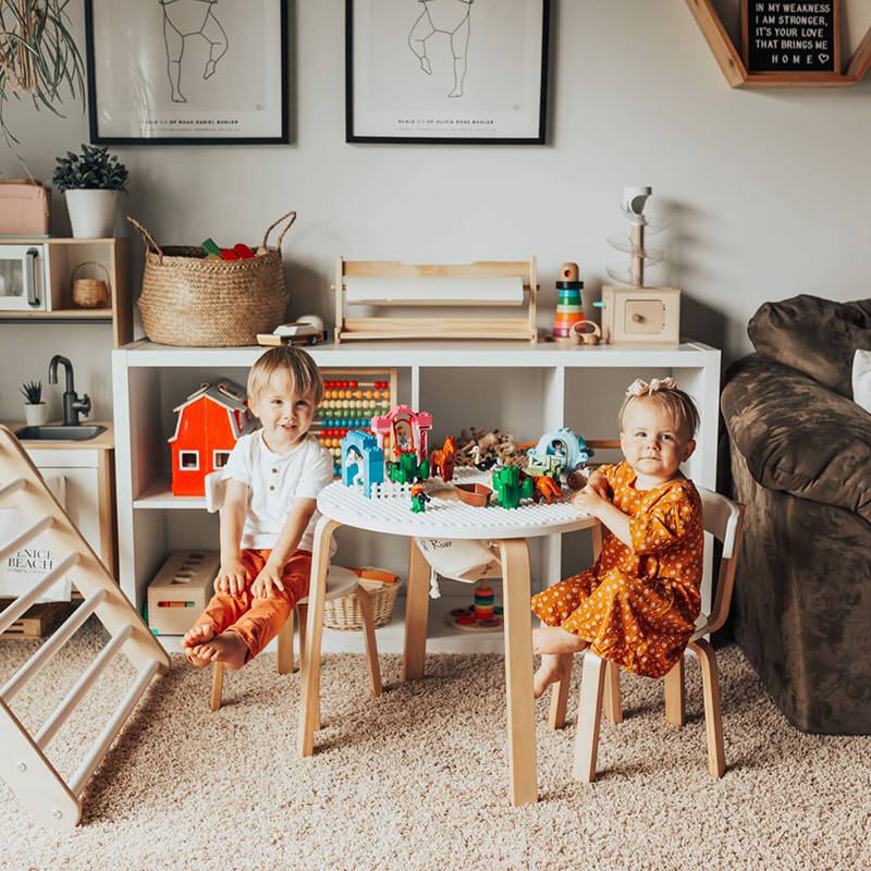 Lily and River Little Creator Showing Two KId Sitting And The Smart Table Is Full Of Toys