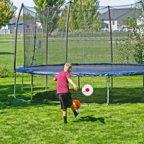 Skywalker Kickback Game Accessory for trampolines with Boy Playing soccer