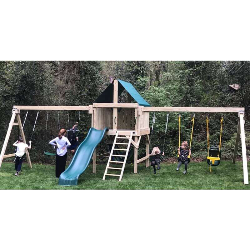 Swing Extreme Swing Set with kids on the swings in a yard