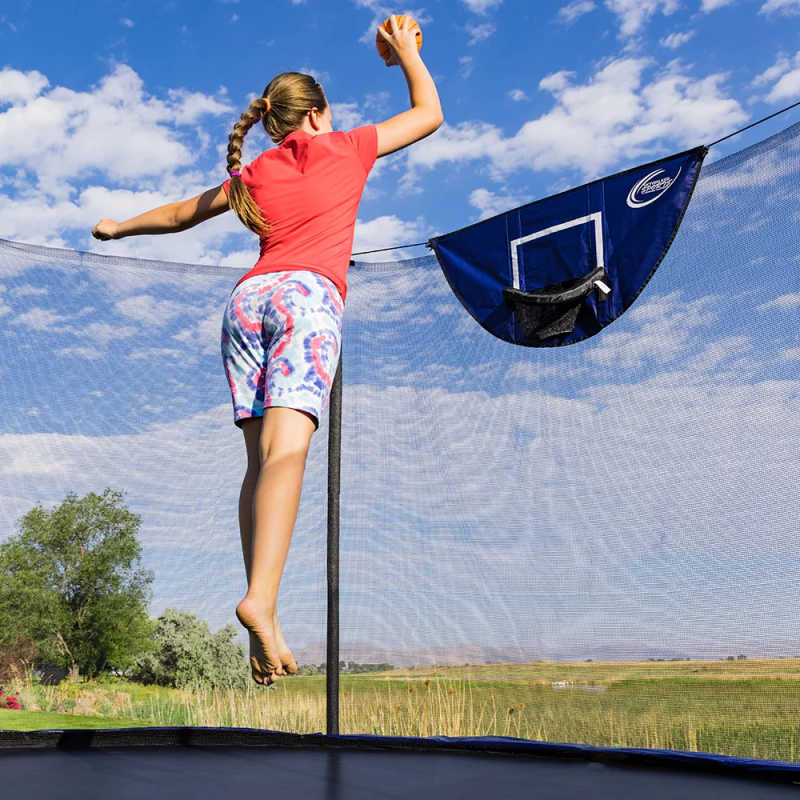 Skywalker Trampoline Basketball Hoop with girl dunking