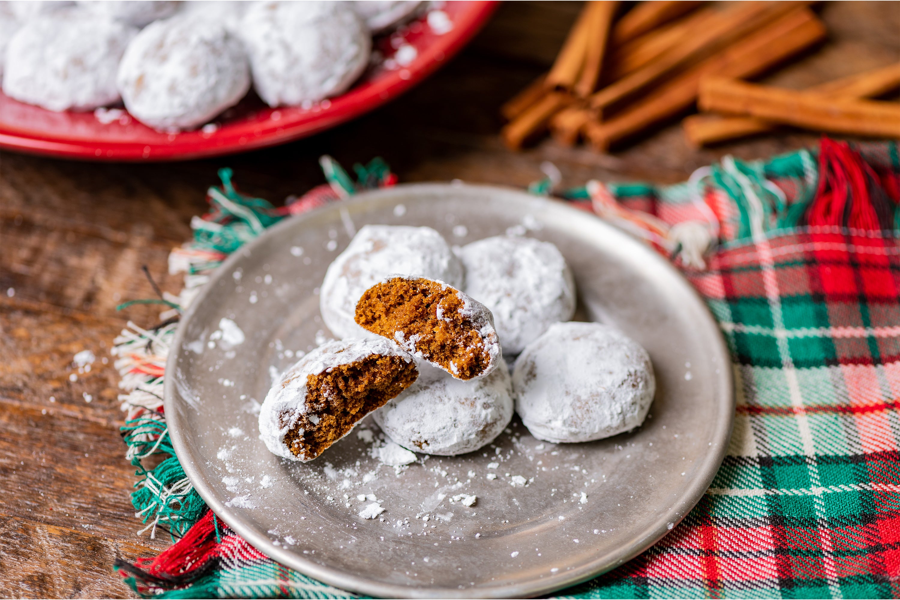 Pfefferneuse Cookies on a red and green plaid napkin