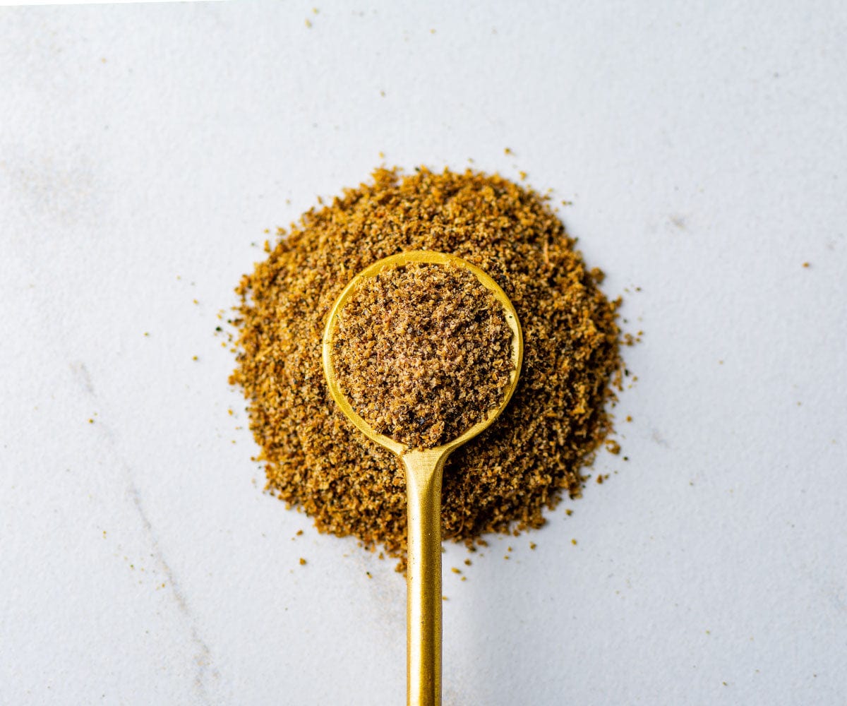 https://cdn.shopify.com/s/files/1/0564/3904/6331/products/garam-masala_spoon_macro_1200x1000.jpg?v=1663252445