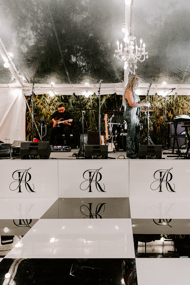 monogram logo on wedding band stage dance floor by Elegant Quill