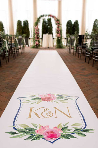 hand painted monogram crest on wedding aisle runner