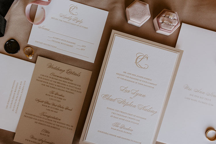 wedding invitation with Elegant Quill monogram