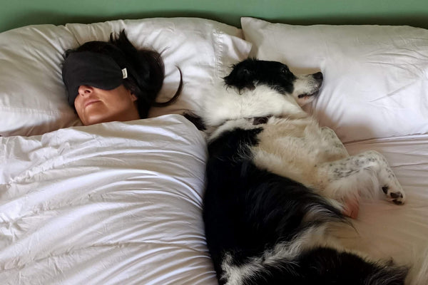 Sarah and Storm sleeping soundly with Kind Face Duvet, Pillows and Sleep Mask