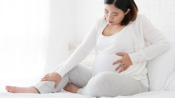 pregnant woman in bed