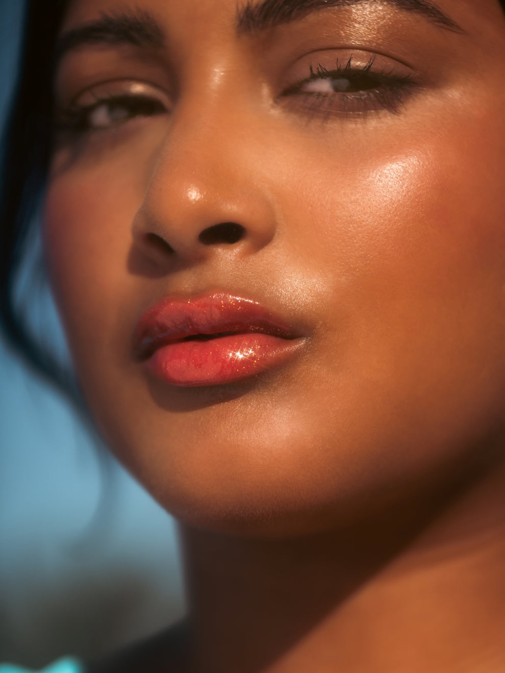 Dibs Beauty - Sonali wearing Go To Glossy Balm - Strawberry Summer